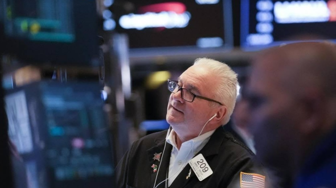 Thị trường chứng khoán thế giới ngày 26/1: Dow Jones hồi phục mấp mé trên mốc tham chiếu