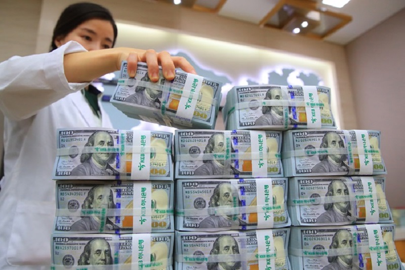 Chu kỳ thắt chặt tiền tệ được dự báo vẫn tiếp tục vào 2023. Ảnh: Yonhap News