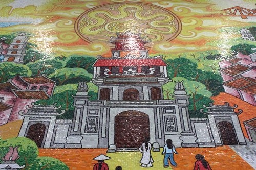 Hãy khám phá Bức tranh gốm cao kỷ lục của Việt Nam - một tác phẩm nghệ thuật đầy màu sắc và ý nghĩa. Bức tranh được làm từ những viên gốm tinh xảo, đem lại một sắc màu đầy cảm hứng và tuyệt vời. Hình ảnh này sẽ đưa bạn đến với thế giới nghệ thuật độc đáo và làm say đắm lòng người yêu nghệ thuật.